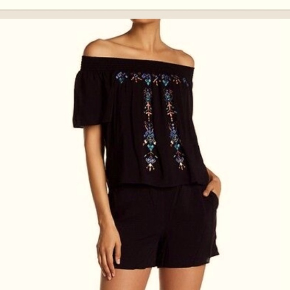 Off the shoulder romper with floral embroidery and pockets